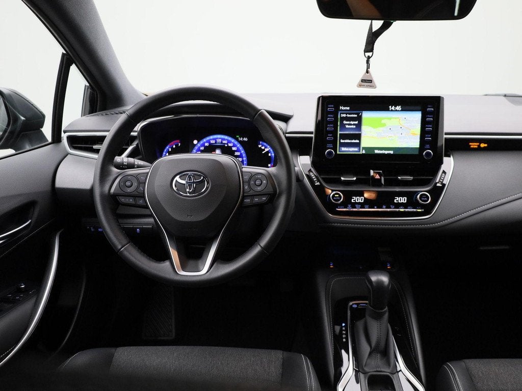 Toyota Corolla 1.8 Hybrid Business Plus | Automaat | Stoel v, Auto's, Toyota, 12 maanden, 450 kg, Gebruikt, 4 cilinders