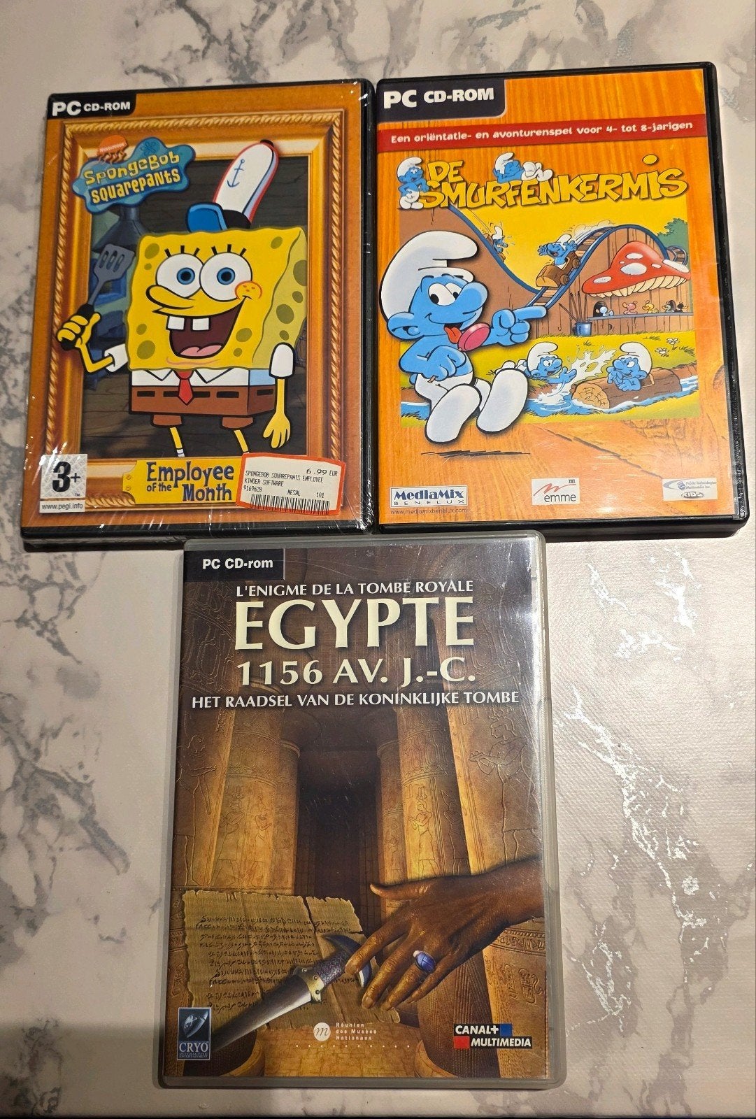 3 PC CD-ROM spellen: Smurfenkermis, Egypte, Spongebob, 1 speler, Ophalen of Verzenden, Avontuur en Actie, Vanaf 3 jaar