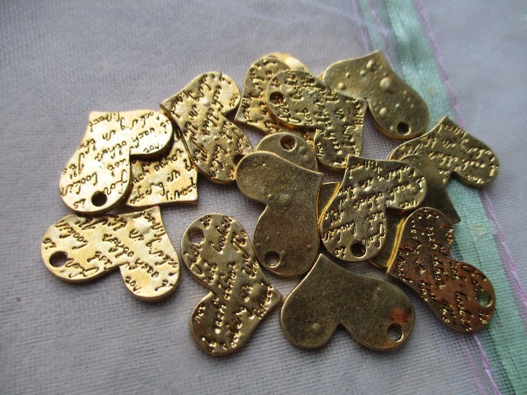 partij gouden tibetiaanse harten bedels, Ophalen of Verzenden, Nieuw, Bedel