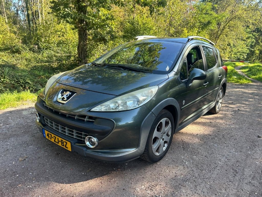 Peugeot 207 1.6 16V SW Outdoor 2008 Grijs, Panoramadak, Zwart, 4 cilinders, Leder en Stof