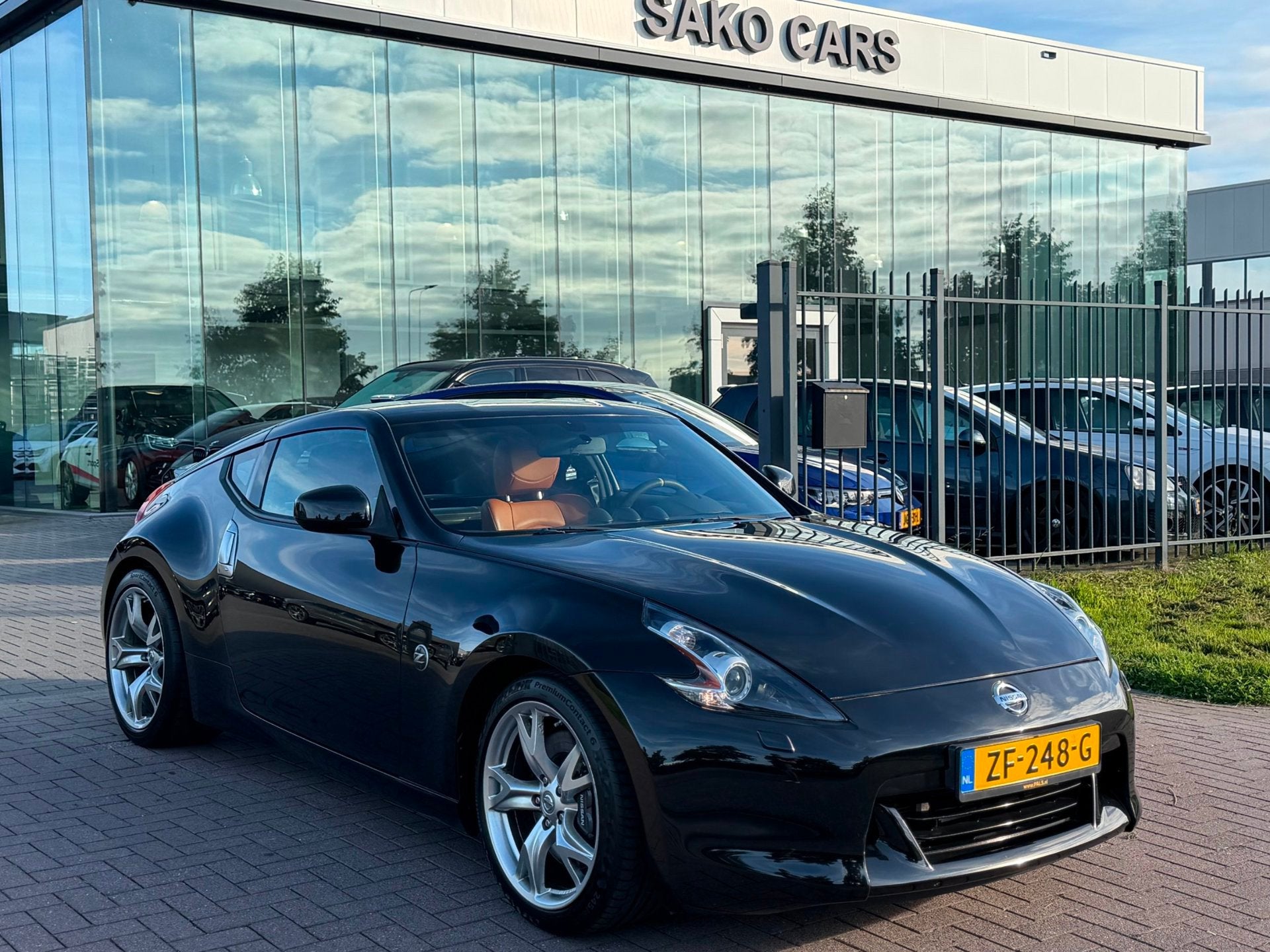 Nissan 370Z 3.7 V6 Pack 2013 328PK Zeer nette staat! Dealer, Auto's, Automaat, Achterwielaandrijving, Gebruikt, 10 km/l