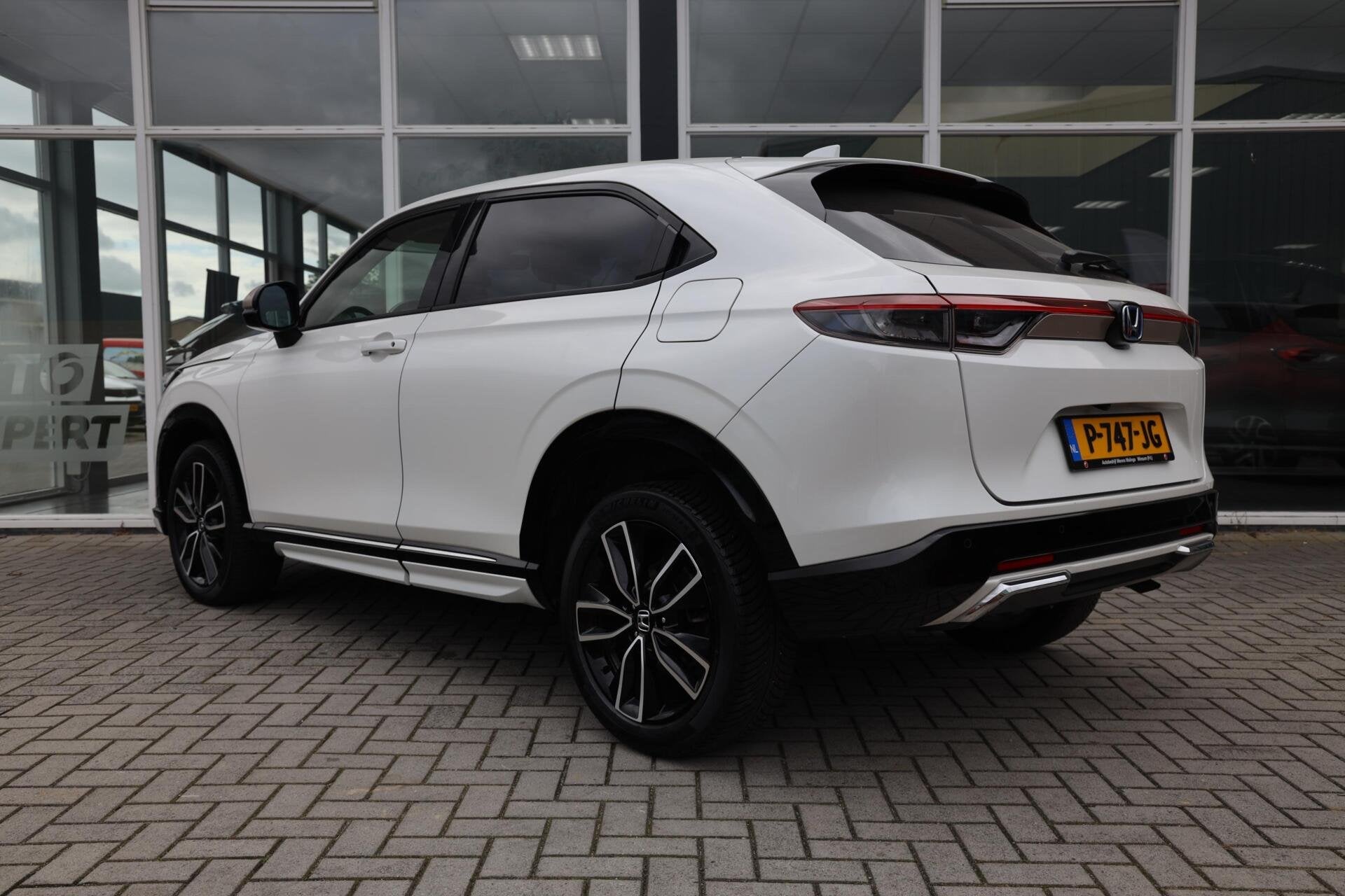 Honda HR-V 1.5 e:HEV Advance Style|Camera|Stoelverwarming|Na, Auto's, Met garantie (alle), Wit, 19 km/l, Hybride Elektrisch/Benzine