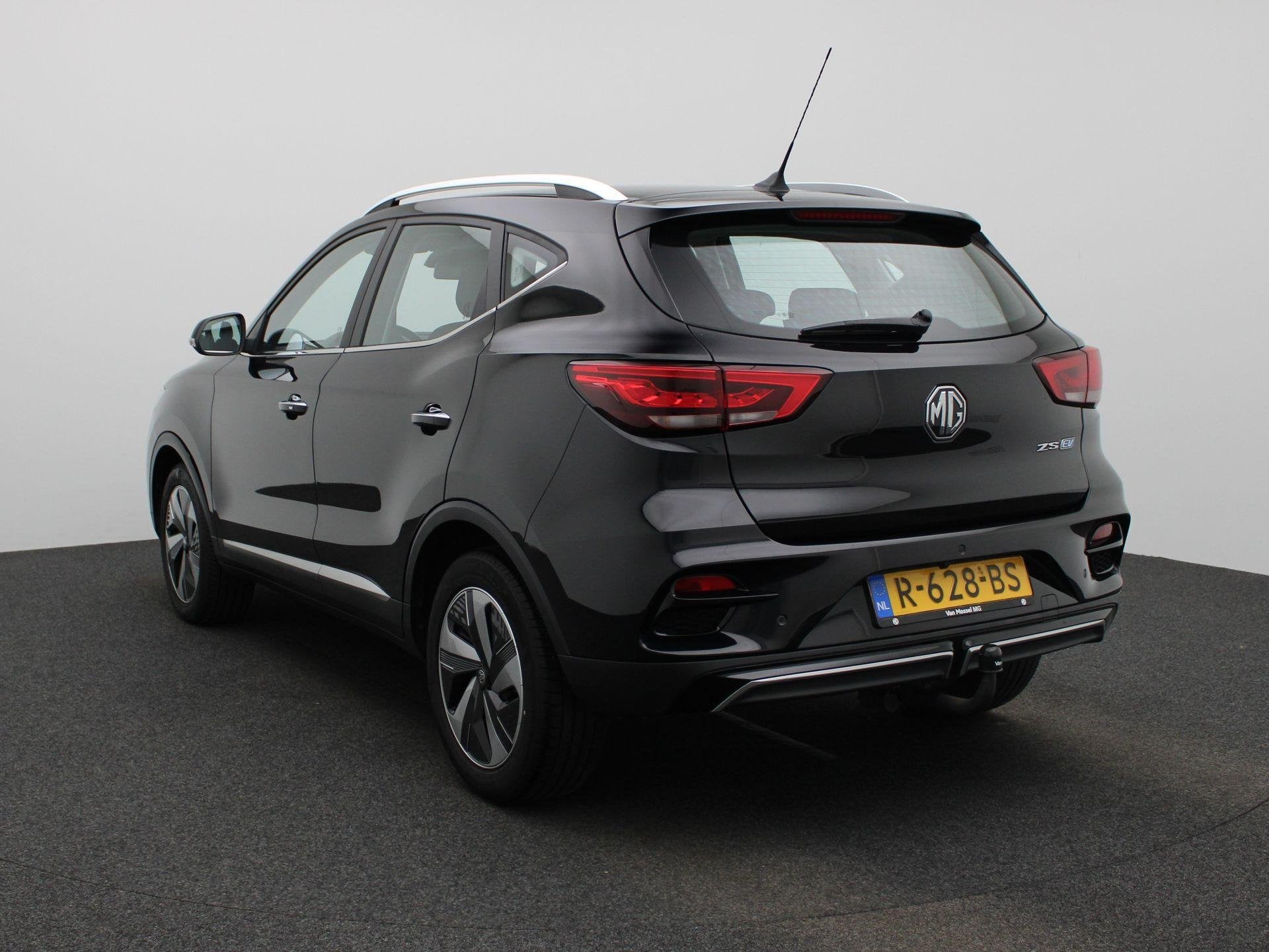 MG ZS EV Standard Range Comfort 50 kWh, Auto's, 12 maanden, Stof, ZS, Zwart