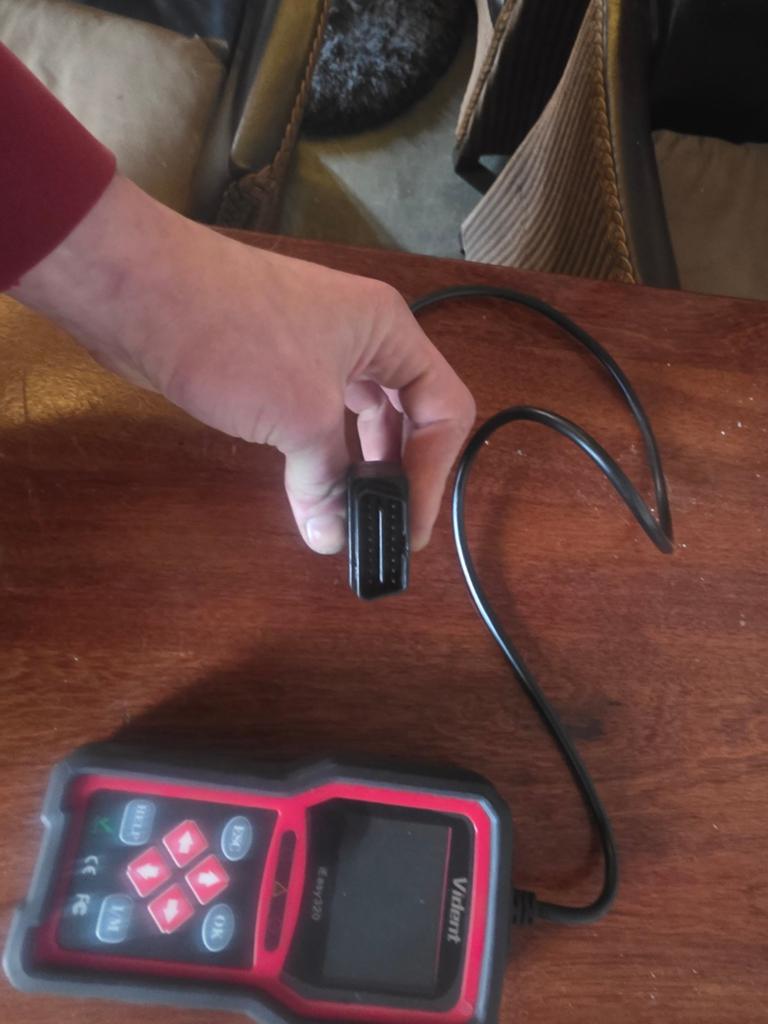 Vident uitleesapparaat auto, Ophalen