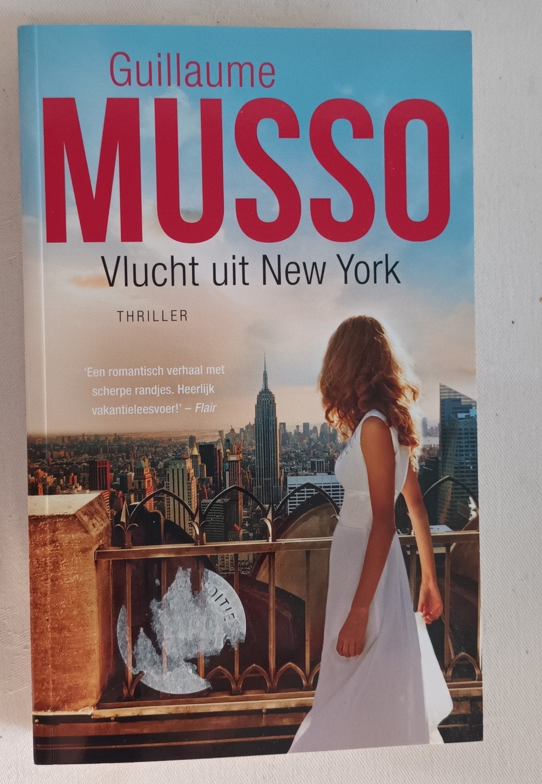 Guillaume Musso - Vlucht uit New York, Gelezen, Ophalen of Verzenden, Nederland, Guillaume Musso