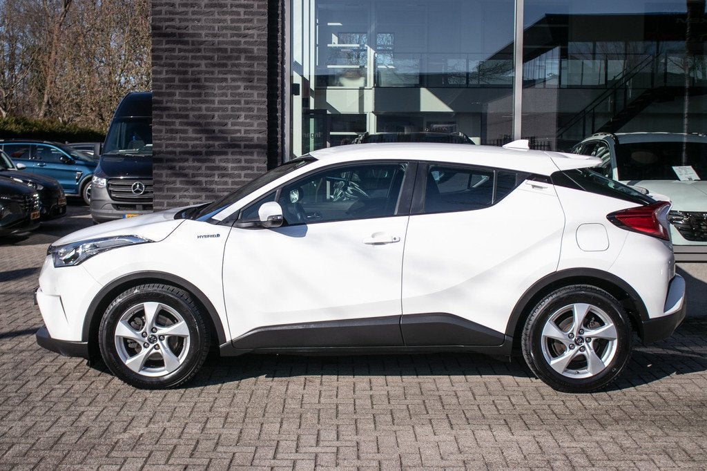 Toyota C-HR 1.8 Hybrid Dynamic | Camera | Navigatie | Stoelv, Auto's, Toyota, Stof, 4 cilinders, 116 pk, Wit