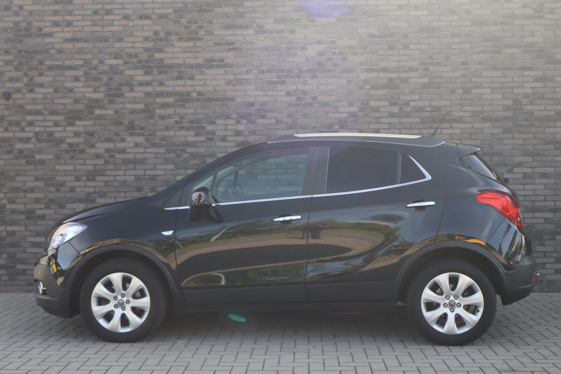 Opel Mokka 1.4 T Cosmo 4x4 | Camera | Trekhaak | Schuifdak |, Auto's, 1325 kg, Gebruikt, 4 cilinders, Zwart