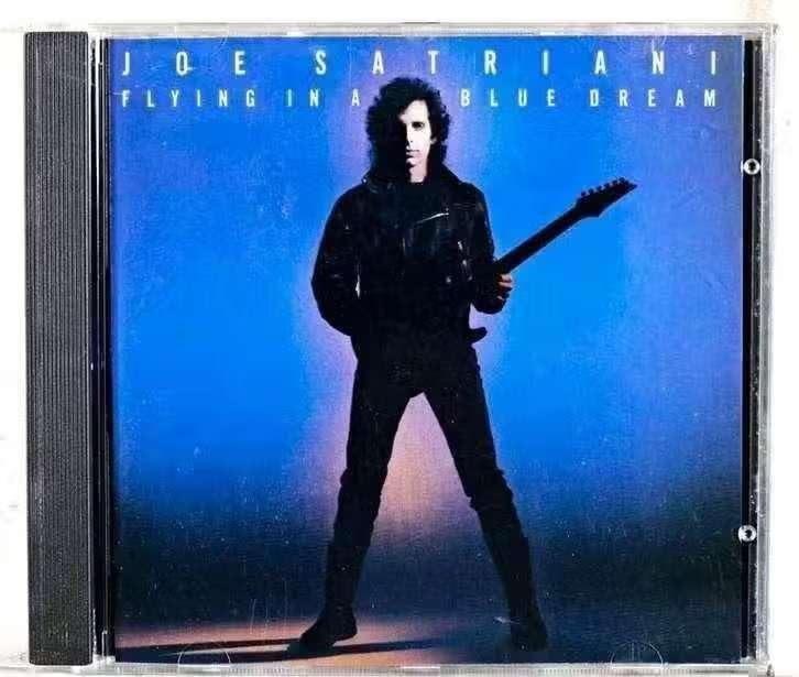 CD Joe Satriani – Flying In A Blue Dream , 465995 2, Ophalen of Verzenden, Zo goed als nieuw, Hardrock, Album