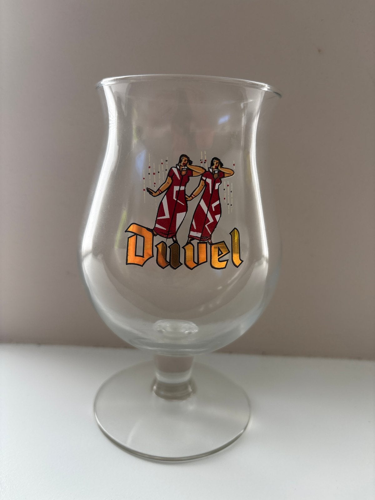Duvel jaarglas 2004 'zingende dames' - helemaal gaaf!, Ophalen of Verzenden, Zo goed als nieuw, Glas of Glazen, Duvel