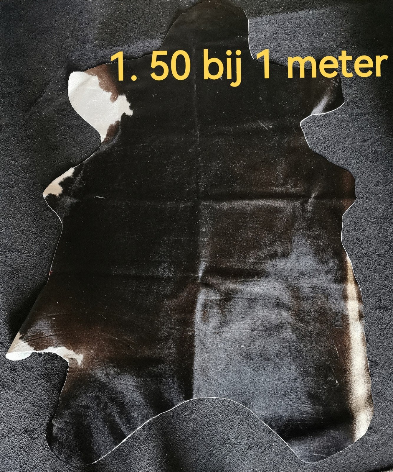 Koeien huid kleed, Ophalen, Zo goed als nieuw