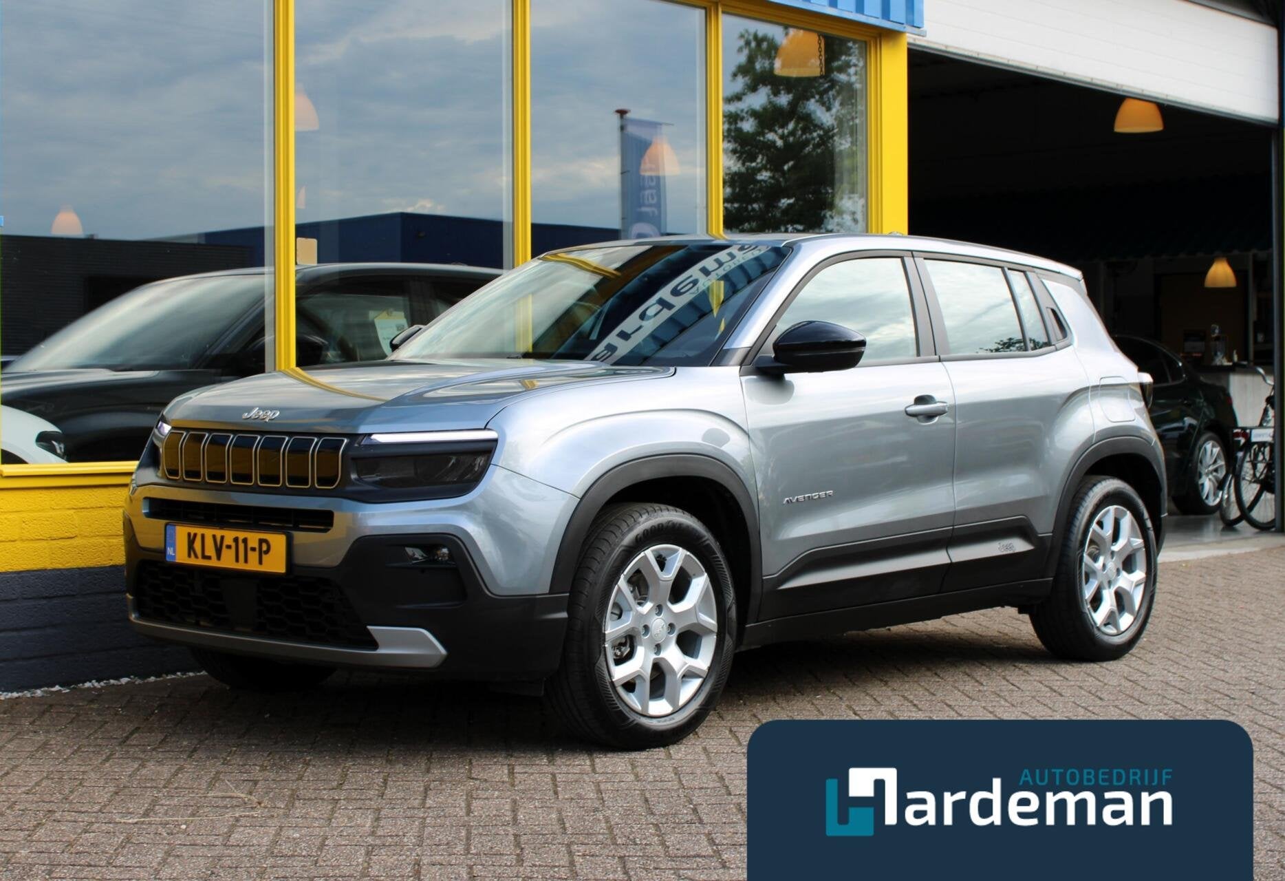 Jeep Avenger Altitude 54 kWh Carplay Camera, Auto's, 394 km, Gebruikt, Met garantie (alle), Leder en Stof