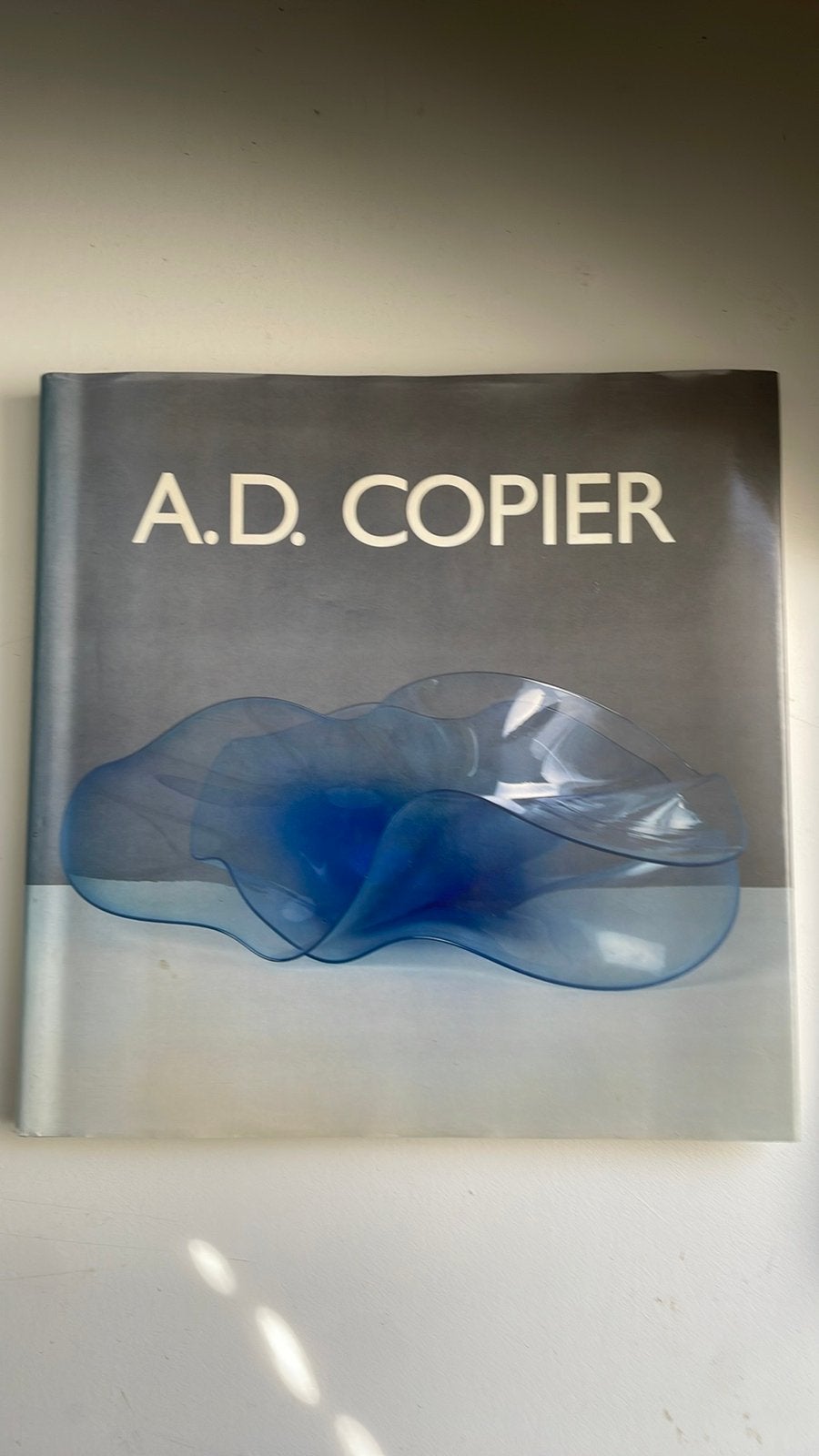 A.D. Copier trilogie in glas boek, Ophalen of Verzenden