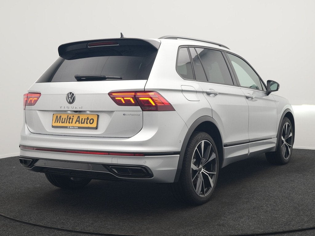 Volkswagen Tiguan 1.4 TSI eHybrid R-Line PHEV 245pk Dealer O, Auto's, Volkswagen, 1716 kg, 4 cilinders, Alcantara, Grijs