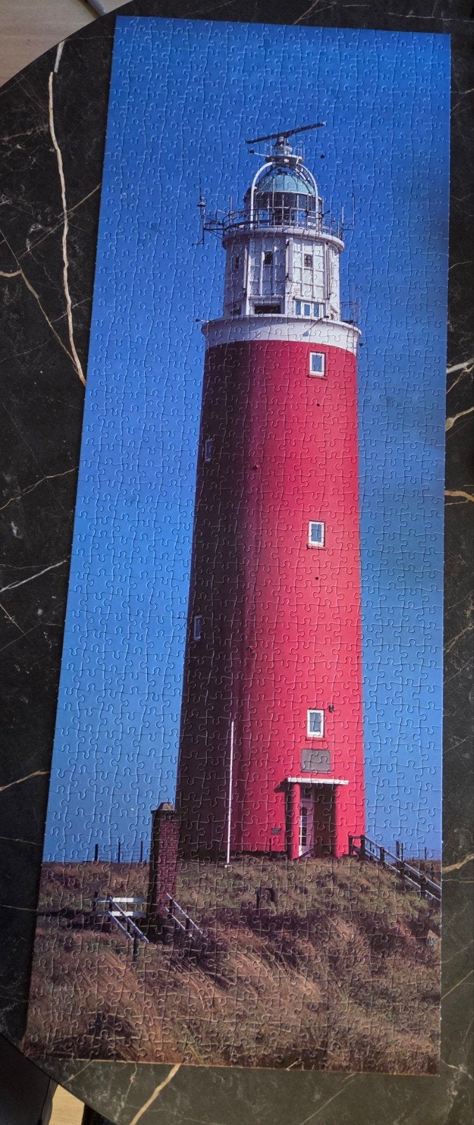 Puzzelbucket Vuurtoren Texel 1000 stukjes, Ophalen of Verzenden, 500 t/m 1500 stukjes, Gebruikt, Legpuzzel