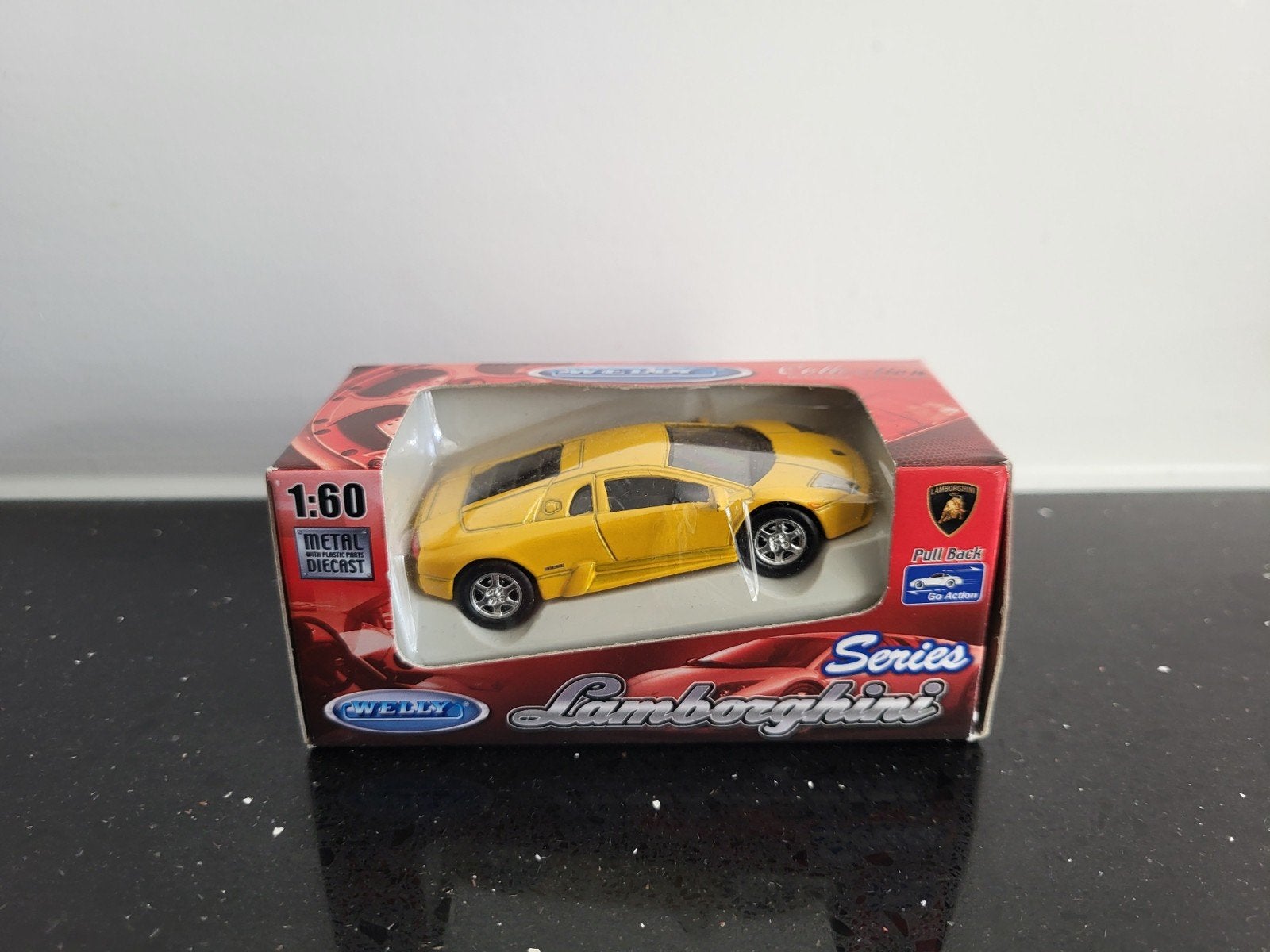 Lamborghini Murcielago geel 1/60 Welly, Ophalen of Verzenden, Zo goed als nieuw, Auto