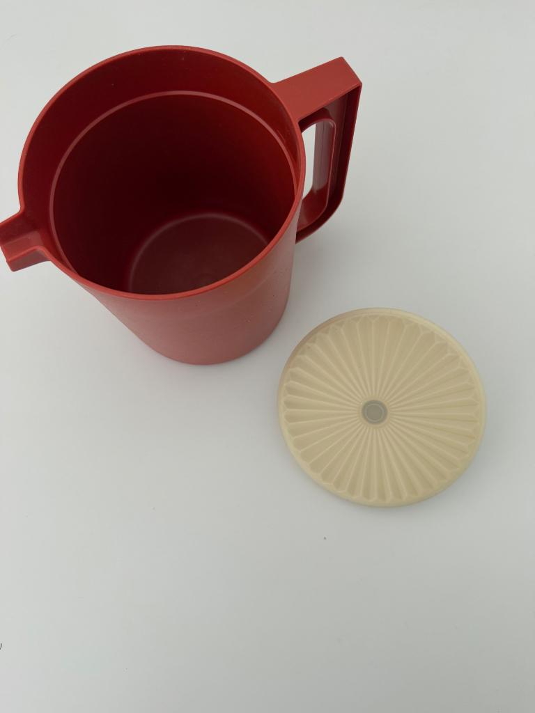 Vintage oranje Tupperware kan, Ophalen of Verzenden, Gebruikt, Oranje, Beker of Kan