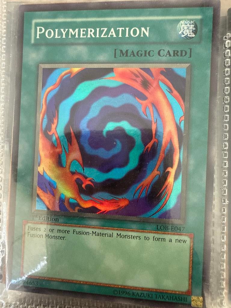 Yu-Gi-Oh! Polymerization LOB-E047 1st Edition, Hobby en Vrije tijd, Verzamelkaartspellen | Yu-gi-Oh!, Gebruikt, Losse kaart, Ophalen of Verzenden