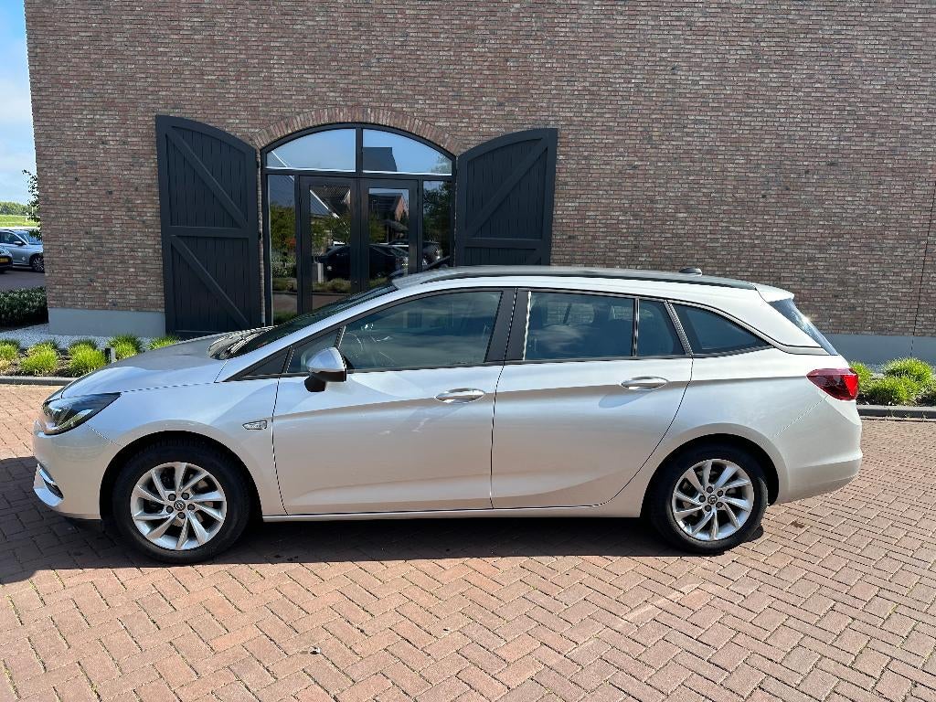 Opel Astra 1.2 Turbo 130pk Start/stop 2019 Grijs, Stof, 1250 kg, 1199 cc, Origineel Nederlands