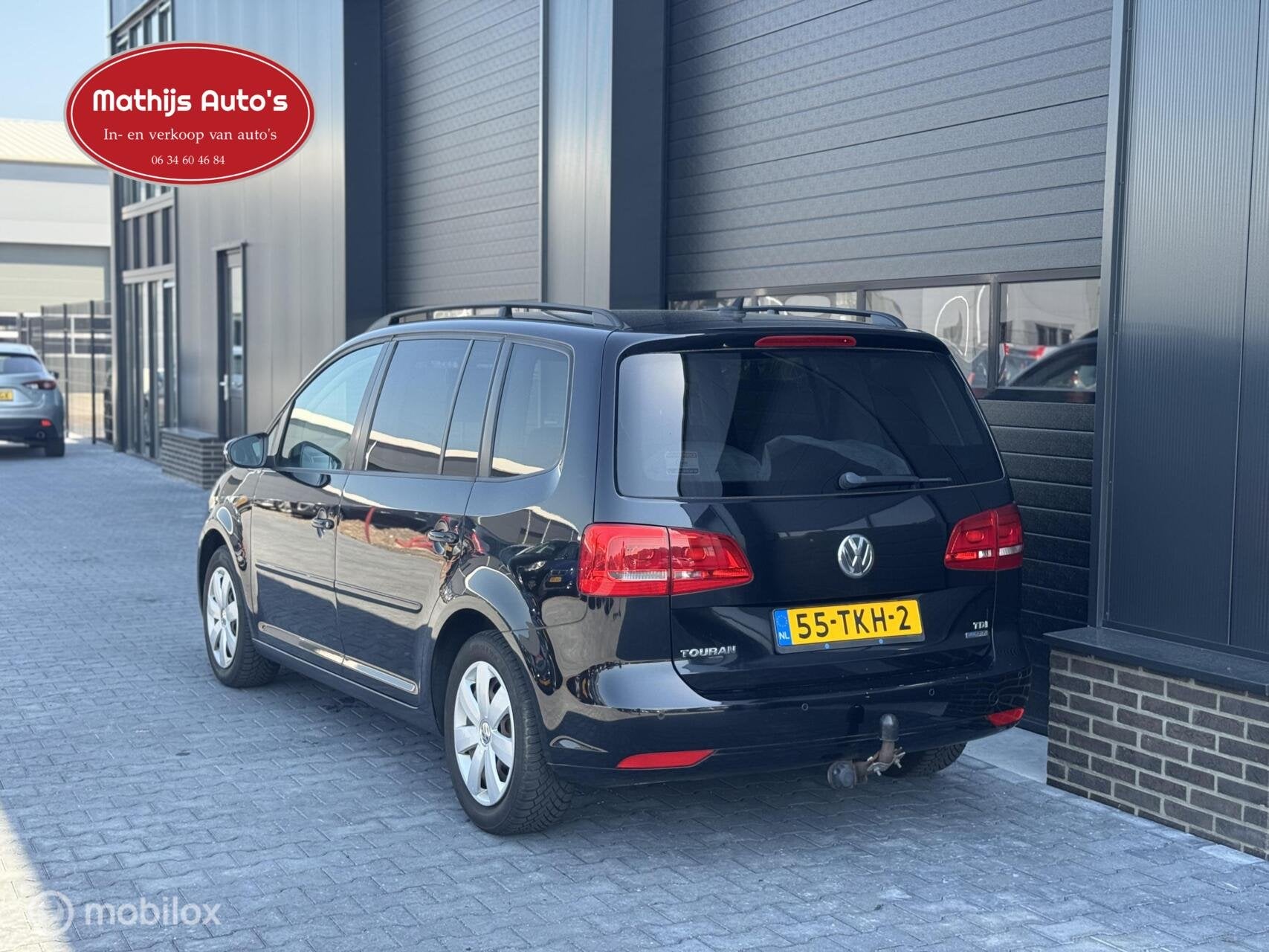 Volkswagen Touran 1.6 TDI Highline BlueMotion, Auto's, Voorwielaandrijving, Euro 5, 4 cilinders, Zwart