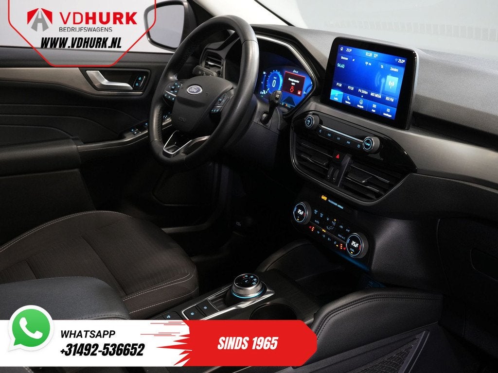 Ford Kuga 2.5 PHEV 225 pk Titanium Stoelverw/ Stuurverw/ Nav, Stof, Gebruikt, 4 cilinders, Wit