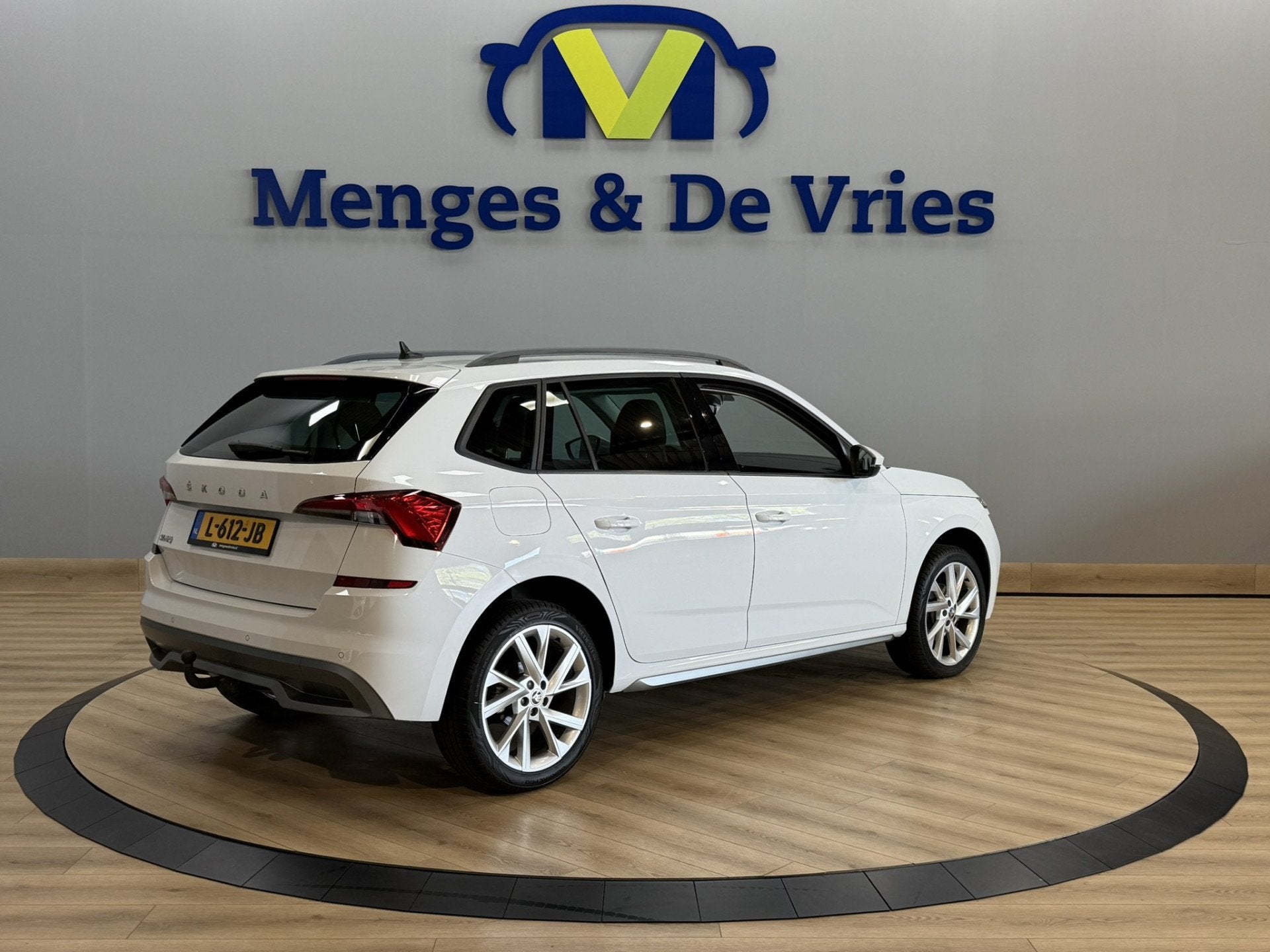 Skoda Kamiq 1.5 TSI ACT Sport Business Airco ECC | Trekhaak, Auto's, 12 maanden, Stof, 4 cilinders, Automatische klimaatregeling