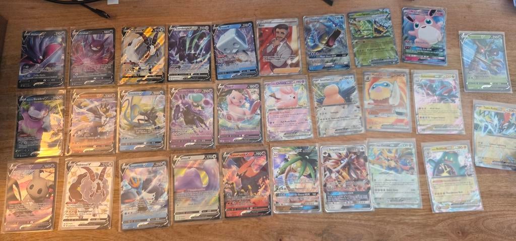 Pokémon kaarten Near Mint, Ophalen of Verzenden, Zo goed als nieuw, Meerdere kaarten, Foil
