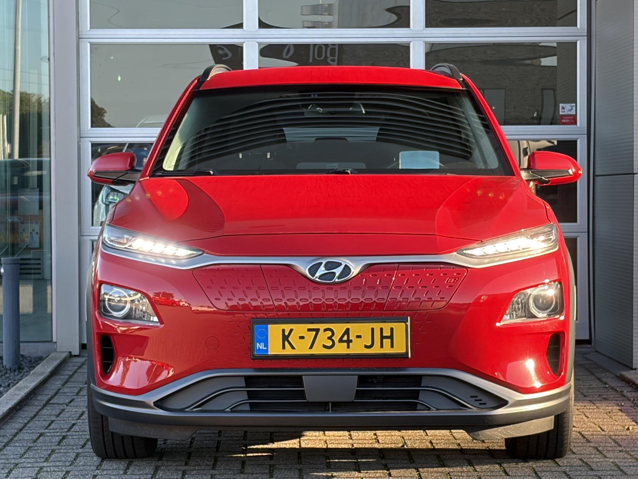 Hyundai Kona EV Fashion 64 kWh I SOH 96.2% I Navigatie i Ach, Stof, Gebruikt, Verwarmde buitenspiegels, Origineel Nederlands
