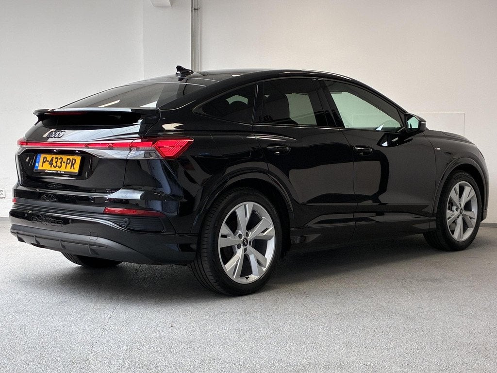 Audi Q4 Sportback e-tron 40 S-Line Competition 77 kWh | SONO, Auto's, Audi, Achterwielaandrijving, Gebruikt, Met garantie (alle)