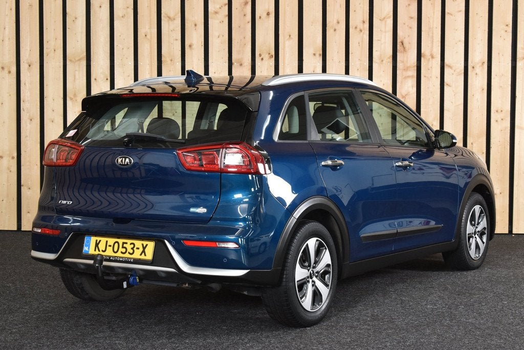 Kia Niro 1.6 GDi Hybrid First Edition Trekhaak CarPlay 116dk, Auto's, Gebruikt, Euro 6, Parkeersensor, Blauw