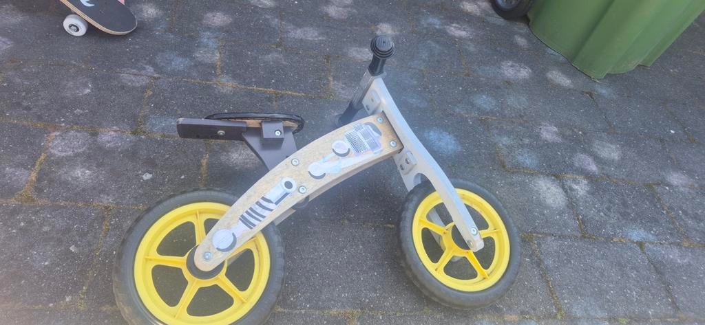 Houten loopfiets met gele wielen, Ophalen of Verzenden, Gebruikt, Loopfiets