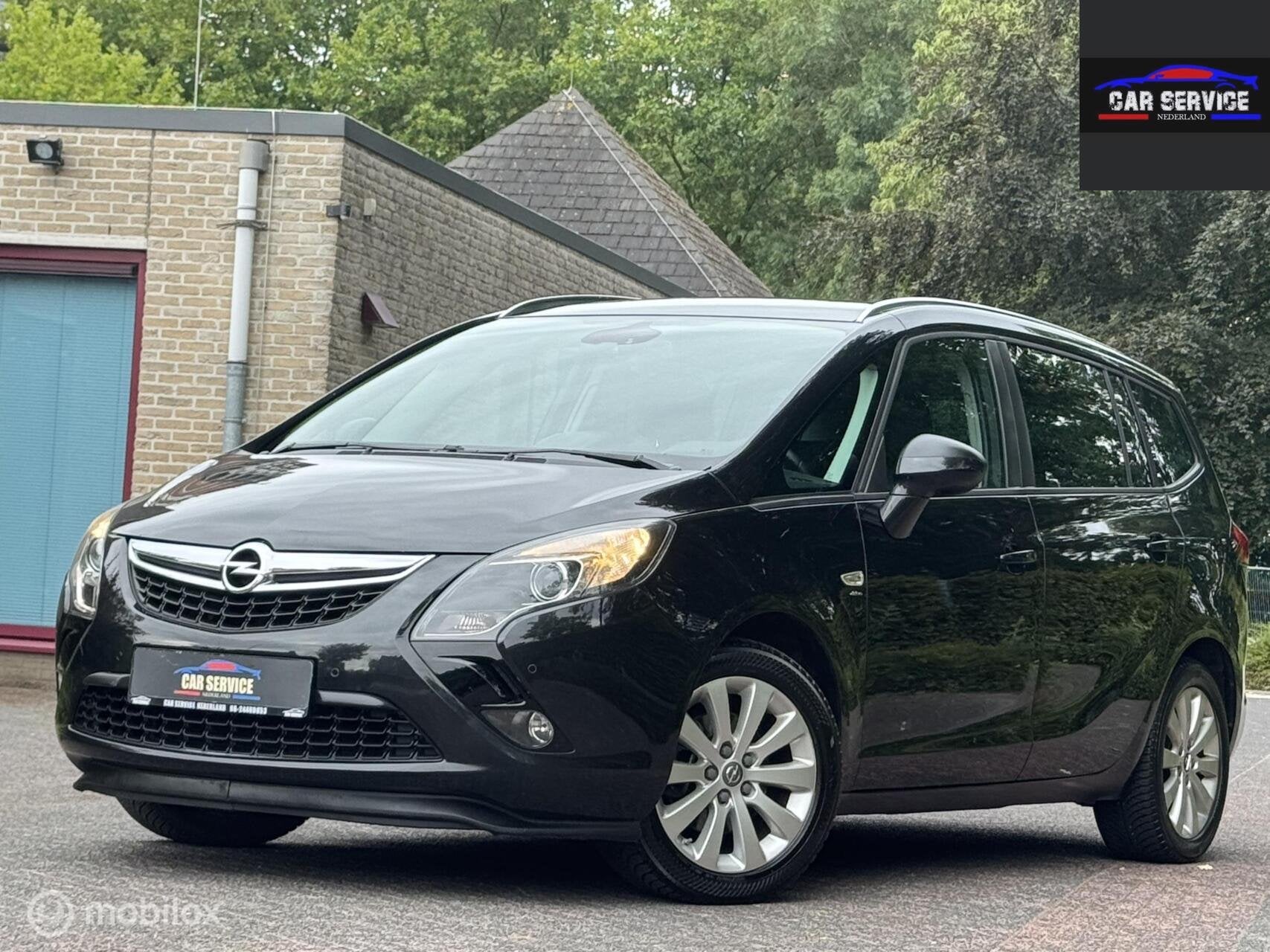 Opel Zafira Tourer 1.4 Business+ 7p/CAMERA/NAVI/PDC/STLVW/, Auto's, Gebruikt, 4 cilinders, 7 stoelen, Leder
