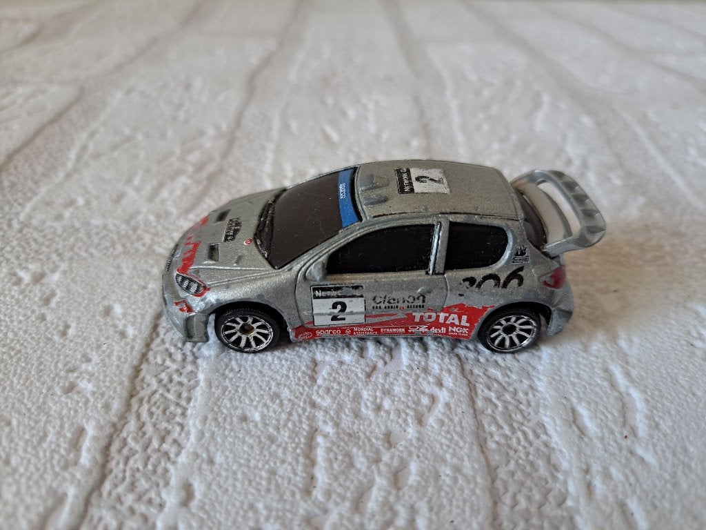 Peugeot 206 WRC Rallyauto 1:57 Majorette, Ophalen of Verzenden, Zo goed als nieuw, Auto