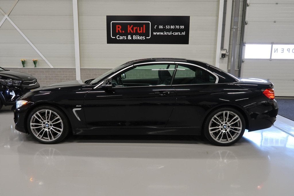 BMW 4-serie Cabrio 430i High Executive Sport 252pk Zwart Lee, Automaat, Achterwielaandrijving, Gebruikt, 4 stoelen
