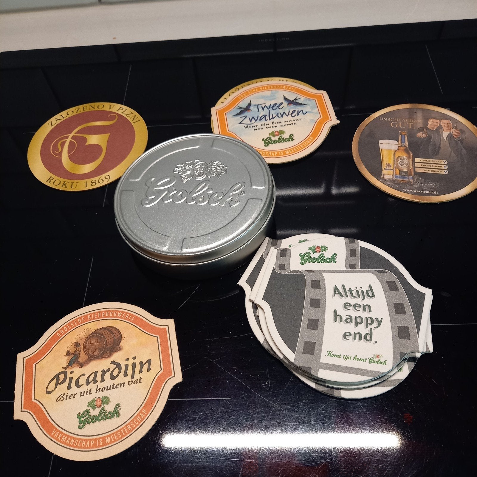 Grolsch blikje met verschillende viltjes, Verzamelen, Biermerken, Ophalen of Verzenden, Gebruikt, Grolsch
