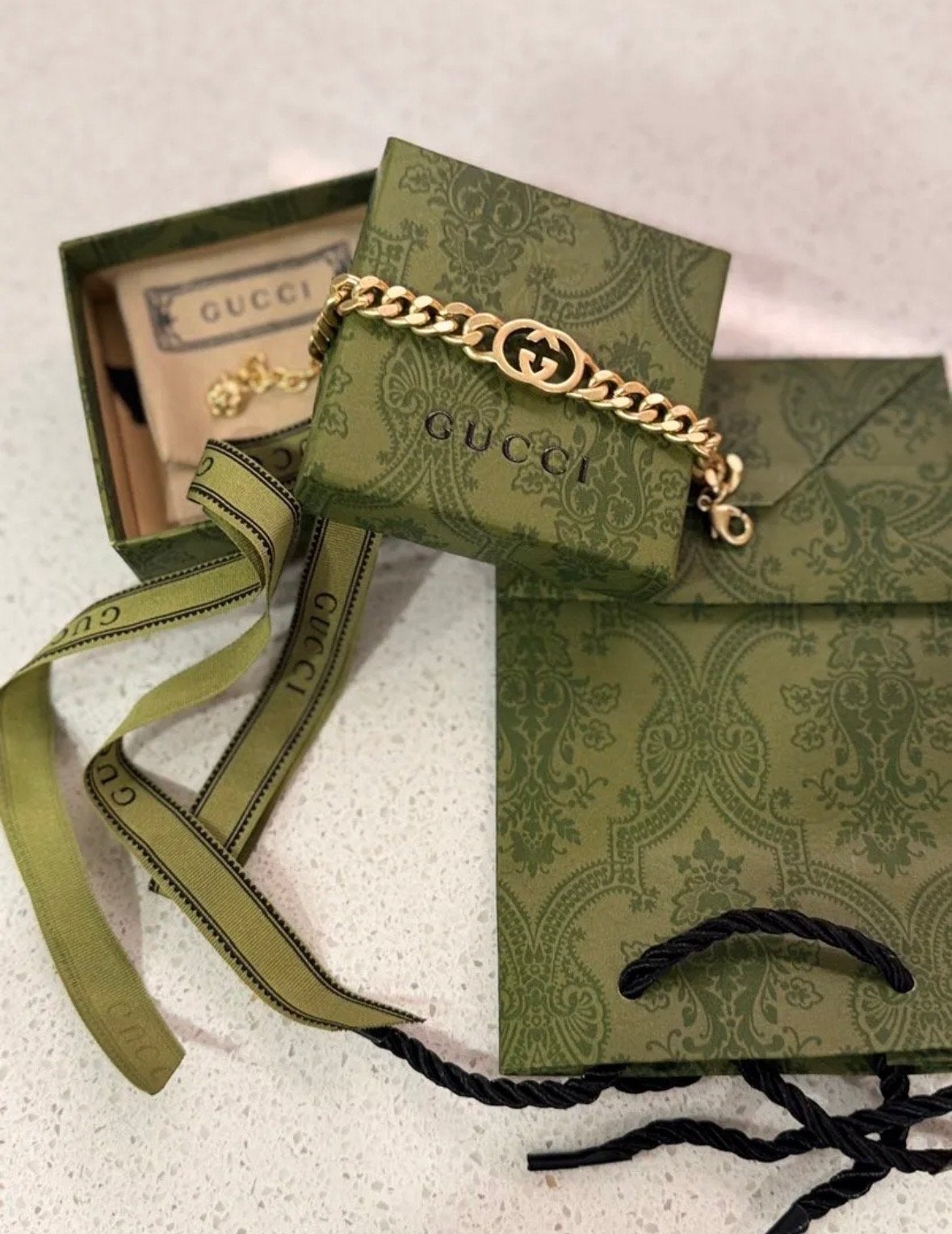 Gucci armband met GG-logo, goudkleurig, Sieraden, Tassen en Uiterlijk, Ophalen of Verzenden, Nieuw, Goud, Goud