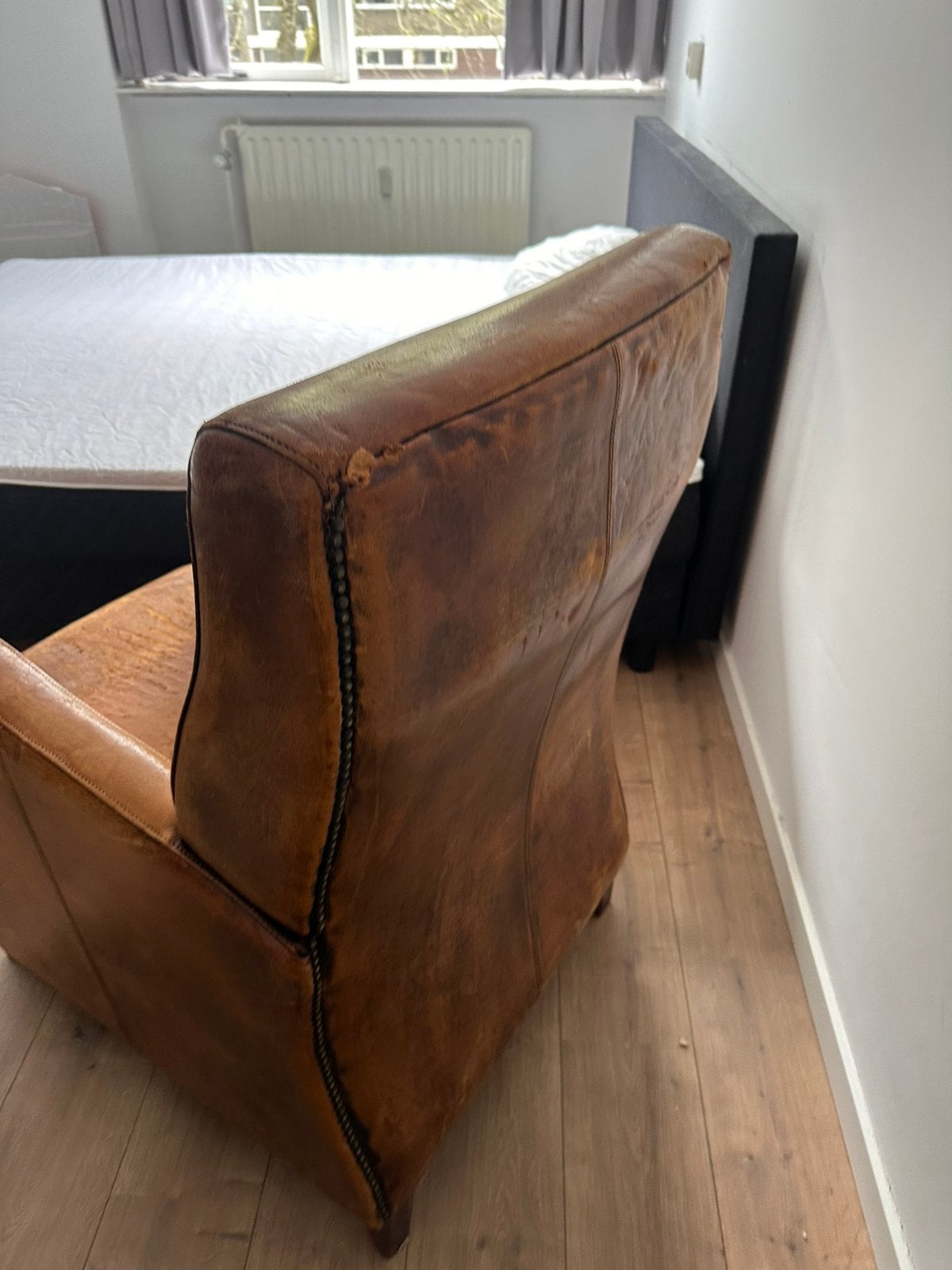 Schaapsleren fauteuil, Huis en Inrichting, Ophalen of Verzenden, Zo goed als nieuw, 75 tot 100 cm, 50 tot 75 cm