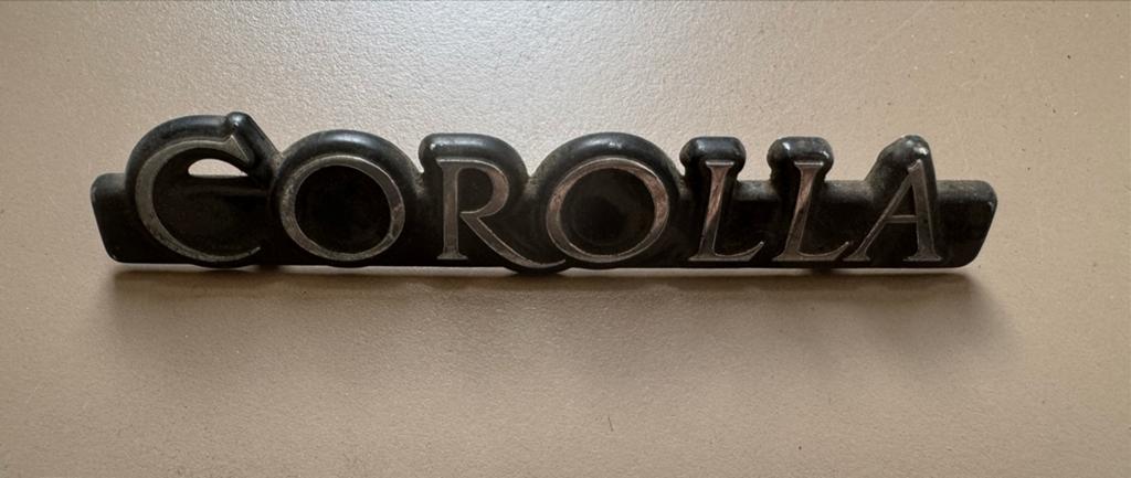Toyota Corolla Embleem - Origineel, Auto-onderdelen, Carrosserie en Plaatwerk, Toyota, Voor, Gebruikt, Ophalen of Verzenden