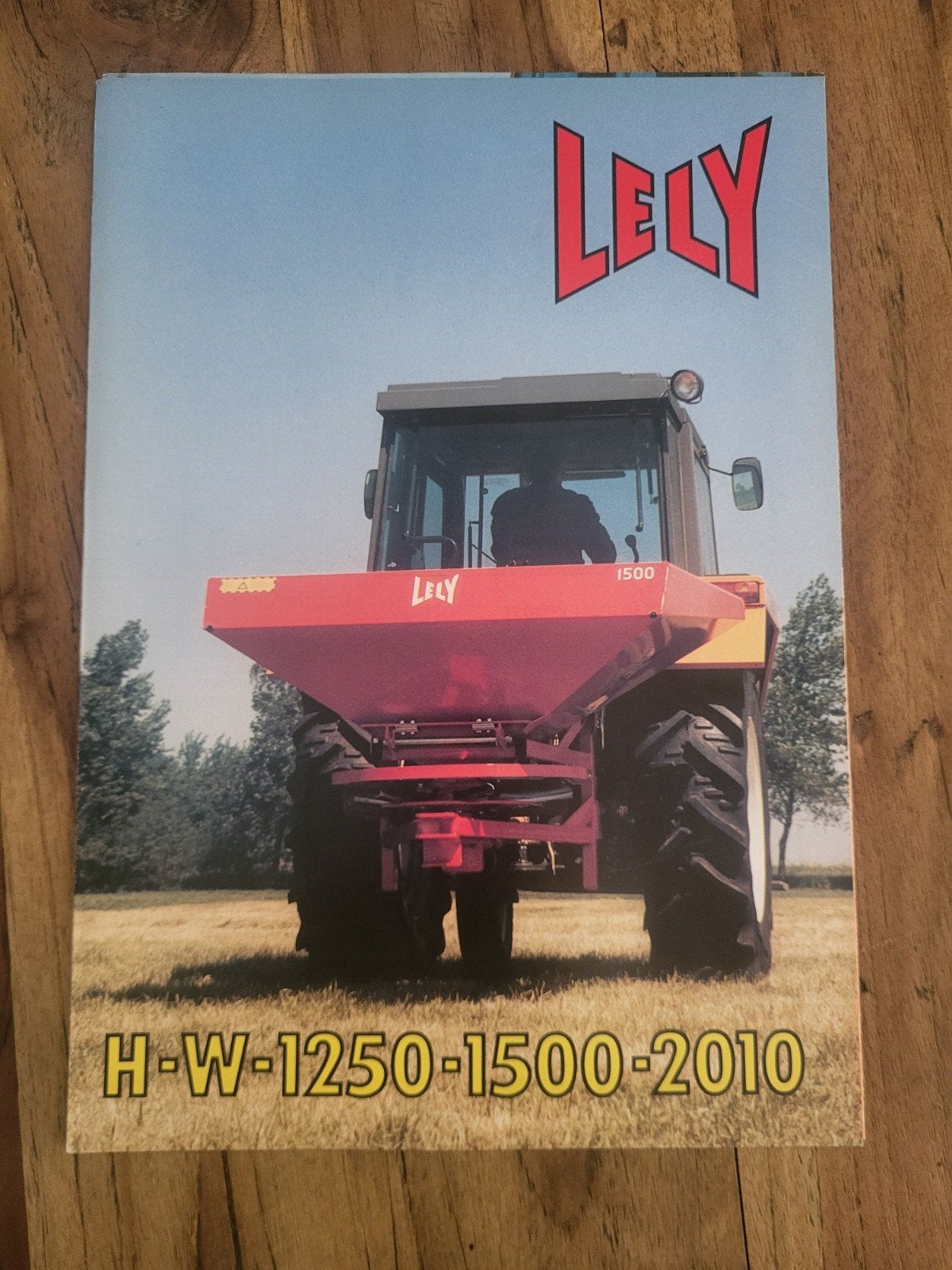 tractor folder Lely H-W-1250-1500-2010 strooiers, Ophalen of Verzenden, Zo goed als nieuw