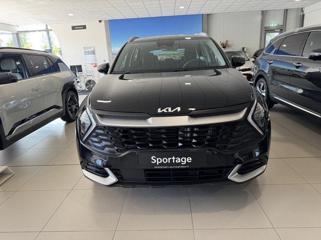 Kia Sportage 1.6 T-GDi Hybrid DynamicLine NIEUW! DIRECT RIJD, Auto's, Kia, Stof, Euro 6, 4 cilinders, 1360 kg