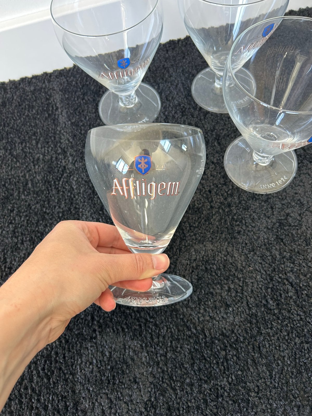 Set van 4 Affligem bierglazen - nieuw, Ophalen of Verzenden, Zo goed als nieuw, Overige merken, Glas