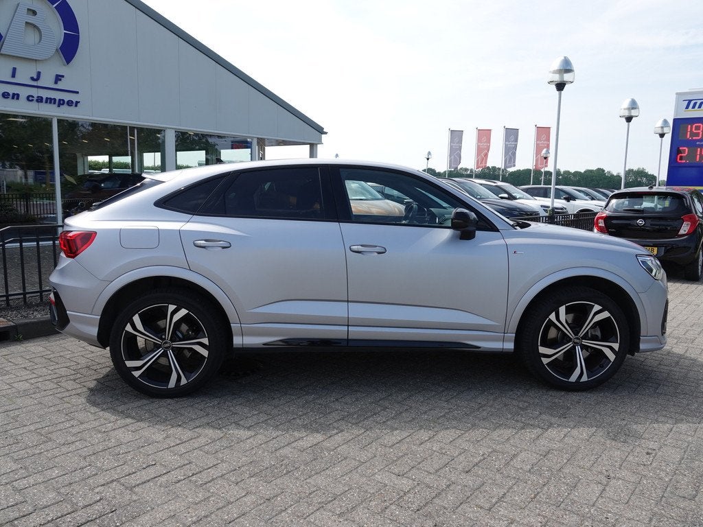 Audi Q3 Sportback 45 TFSI e 245PK S-LINE LEER | NAVI | DODE, Gebruikt, Hybride Elektrisch/Benzine, SUV of Terreinwagen, Automatische klimaatregeling