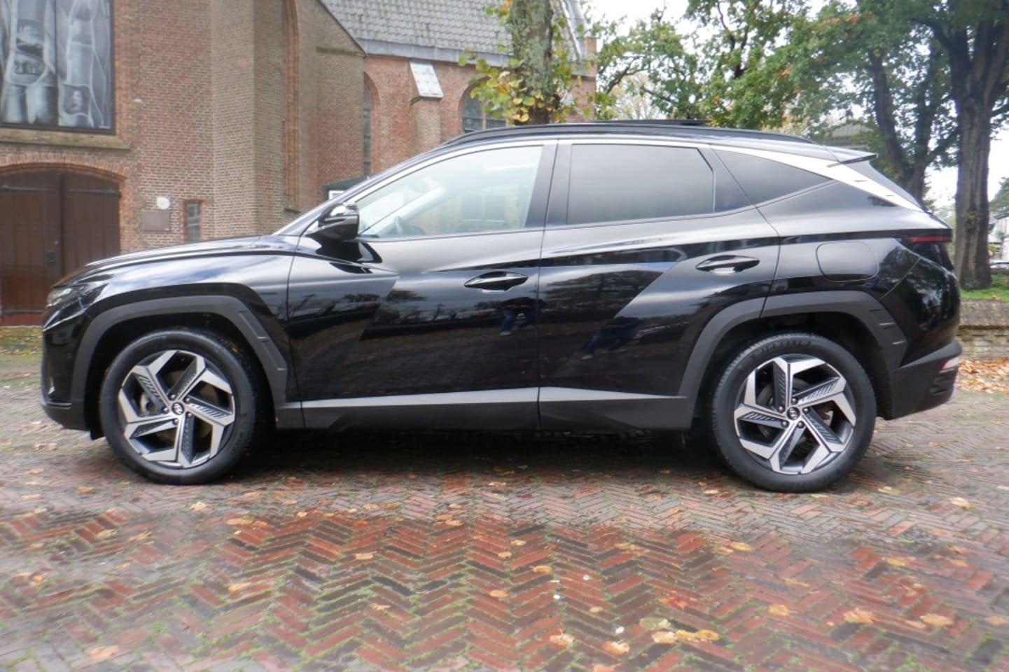 Hyundai TUCSON 1.6 T-GDI HEV i-Motion -PAN.DAK-LEER-STOEL VE, Auto's, Dealer onderhouden, Gebruikt, 4 cilinders, Xenon verlichting