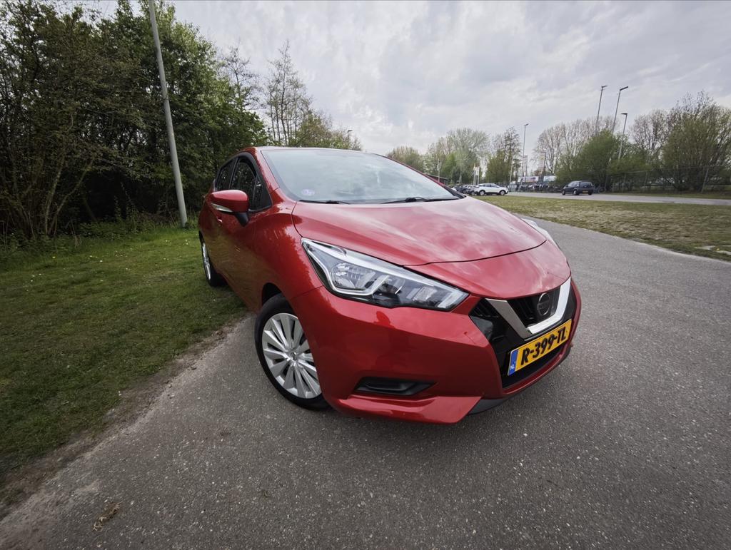Nissan Micra 1.0 Ig-t 92pk 2022 Rood LAGE KILOMETERSTAND, Auto's, Nissan, Voorwielaandrijving, 40 €/maand, Zwart, 4 cilinders