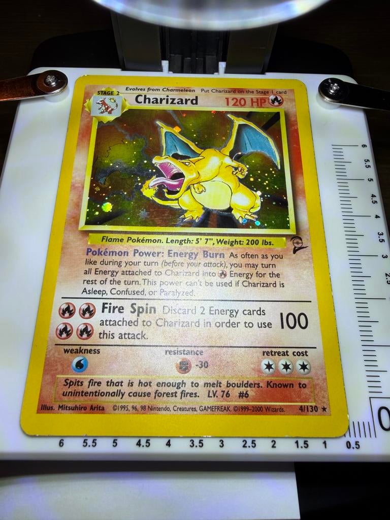Pokémon Charizard 4/130 Holo Rare Base Set 2, Ophalen of Verzenden, Zo goed als nieuw, Losse kaart, Foil