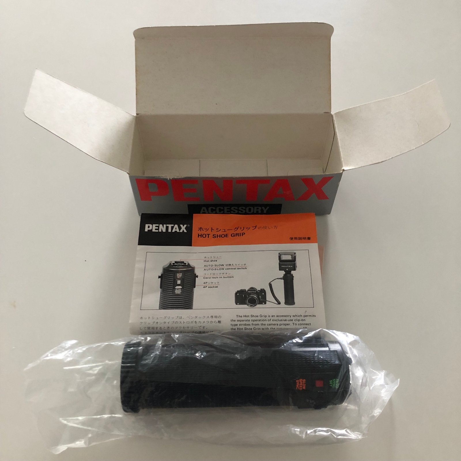 Vintage originele Pentax hot shoe grip - nieuw in verpakking, Pentax, Overige typen, Ophalen of Verzenden, Nieuw