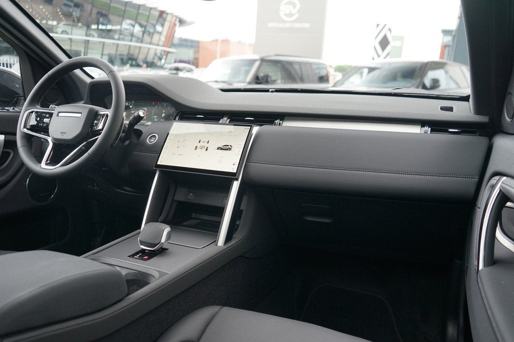 Land Rover Discovery Sport P270e PHEV Dynamic SE Occasion Le, Auto's, Land Rover, 12 maanden, Zwart, Discovery Sport, Zwart