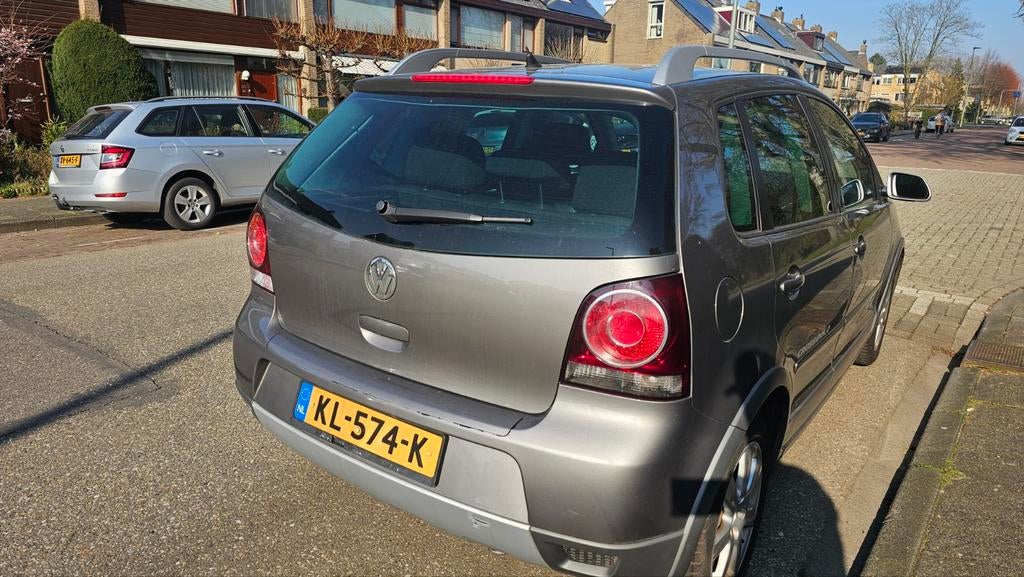 Volkswagen Polo 1.4 16V 59KW Cross 2009 Grijs, Auto's, Voorwielaandrijving, 40 €/maand, Handgeschakeld, Grijs