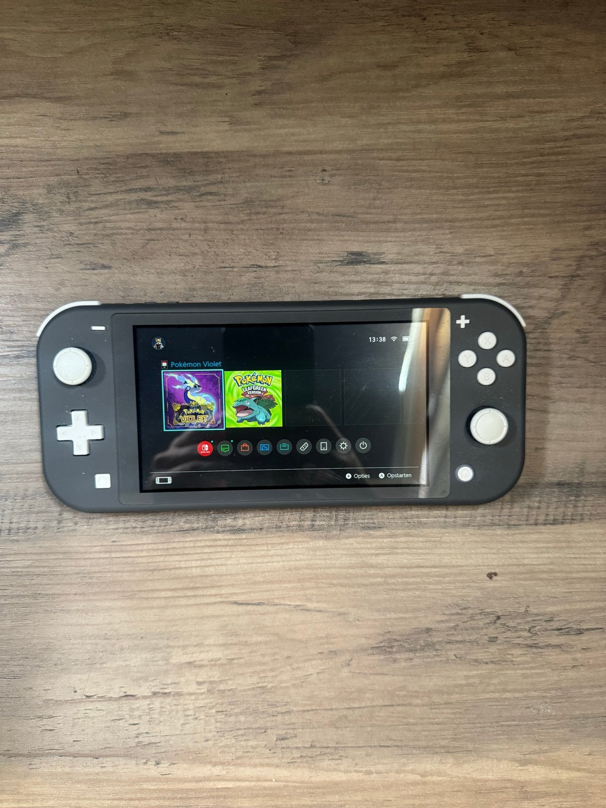 Nintendo Switch Lite met Pokémon Violet, Ophalen of Verzenden, Grijs, Zo goed als nieuw
