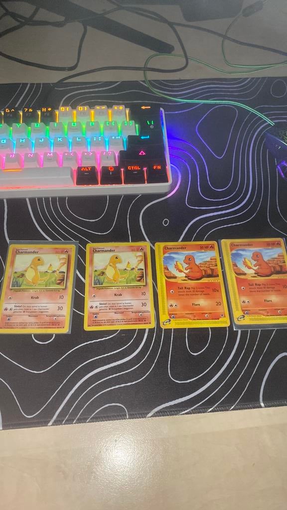 Charmander 2x 1995 46/102 en 2x 2002 97/165, Hobby en Vrije tijd, Ophalen, Zo goed als nieuw, Meerdere kaarten