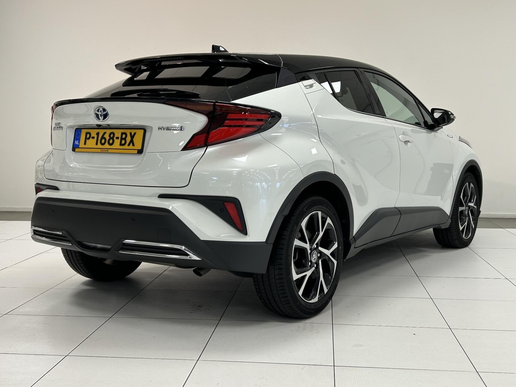 Toyota C-HR 2.0 Hybrid Business Plus | Camera | Navigatie |, Auto's, Stof, 4 cilinders, Met garantie (alle), Wit